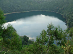 Seven native boys saw the huge ropen fly over this crater lake